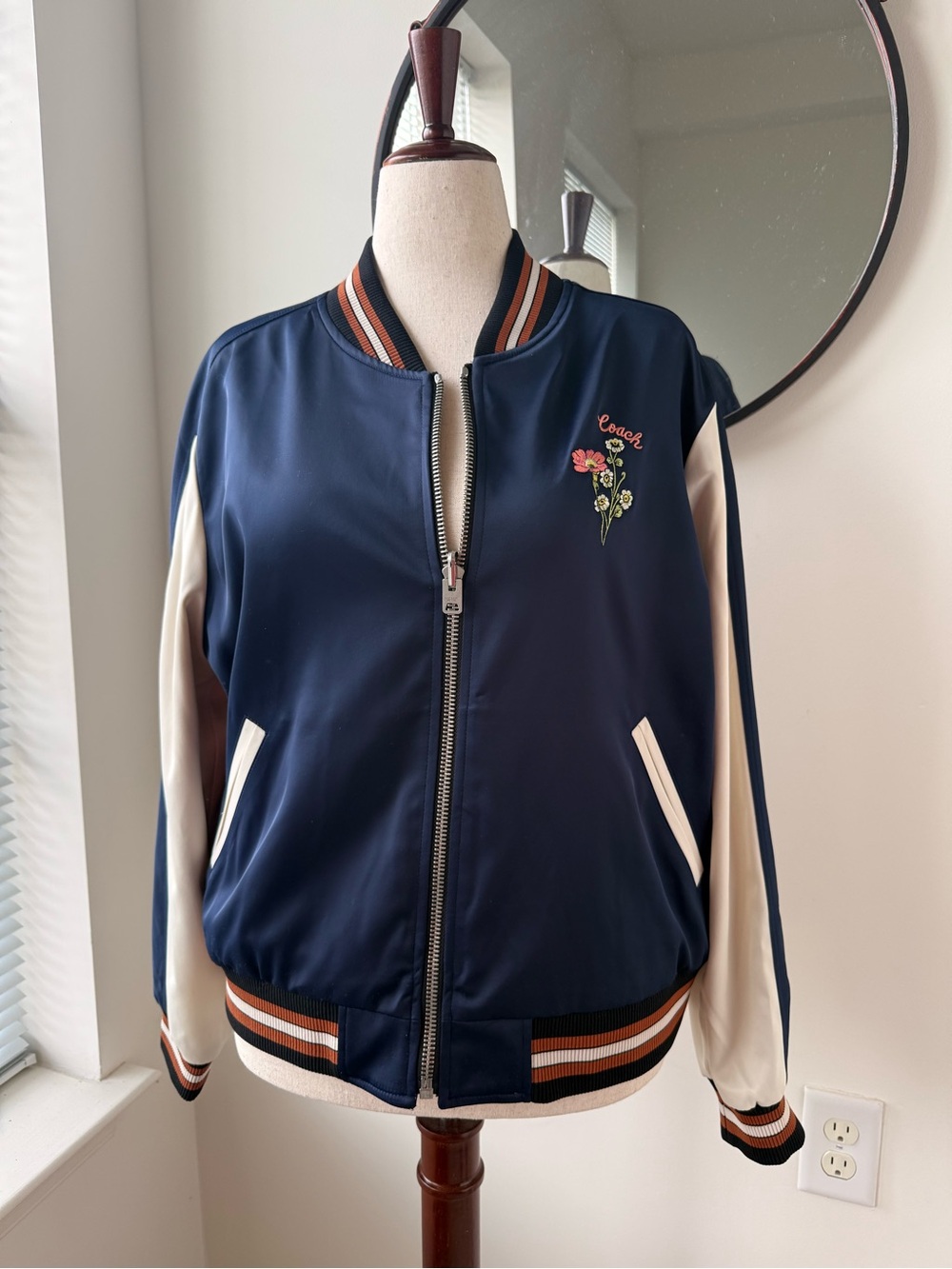 Coach Reversible Navy Bomber Jacket with Cream Sleeves and Floral Embroidery